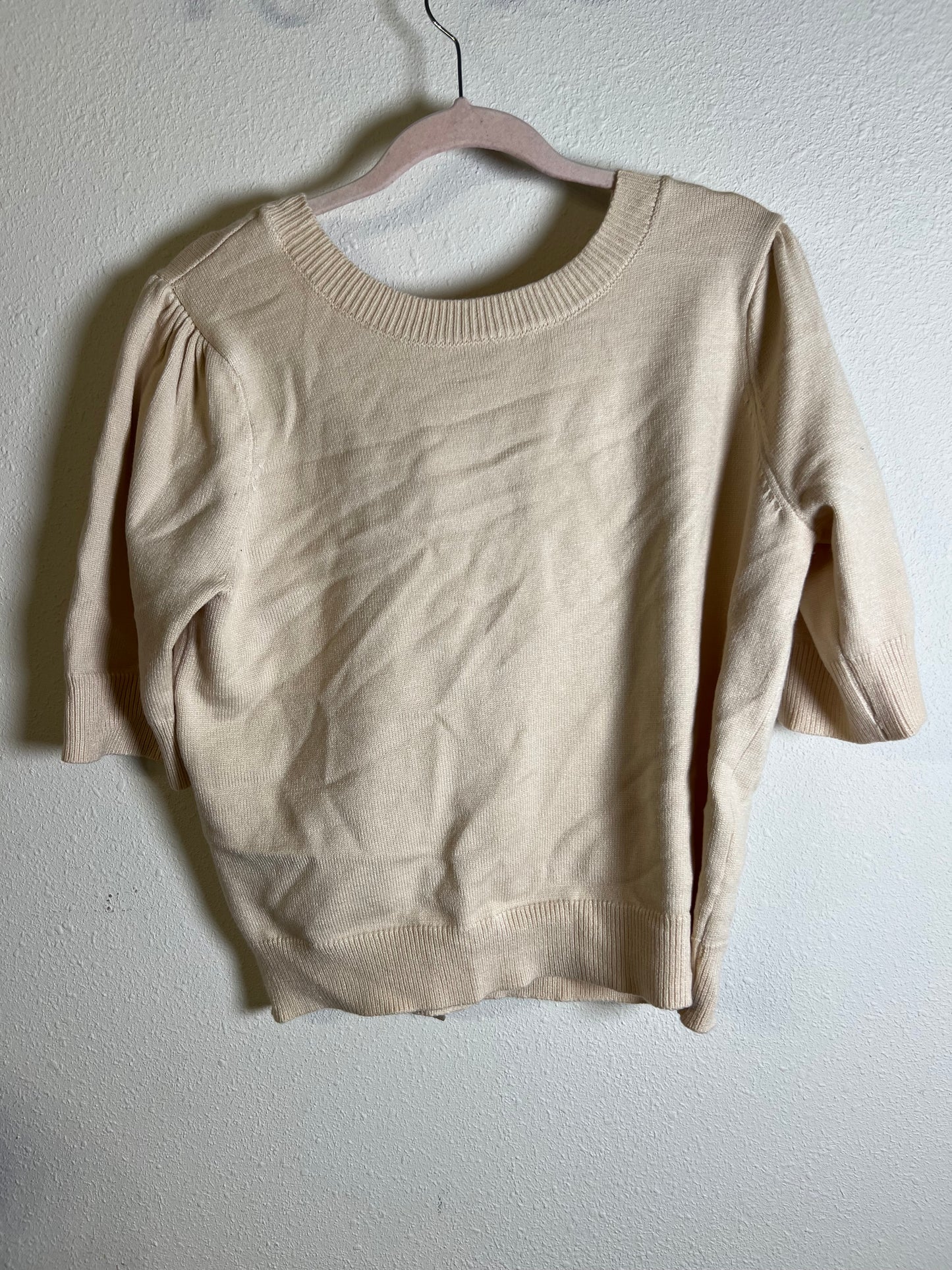 Large tan bow sweater