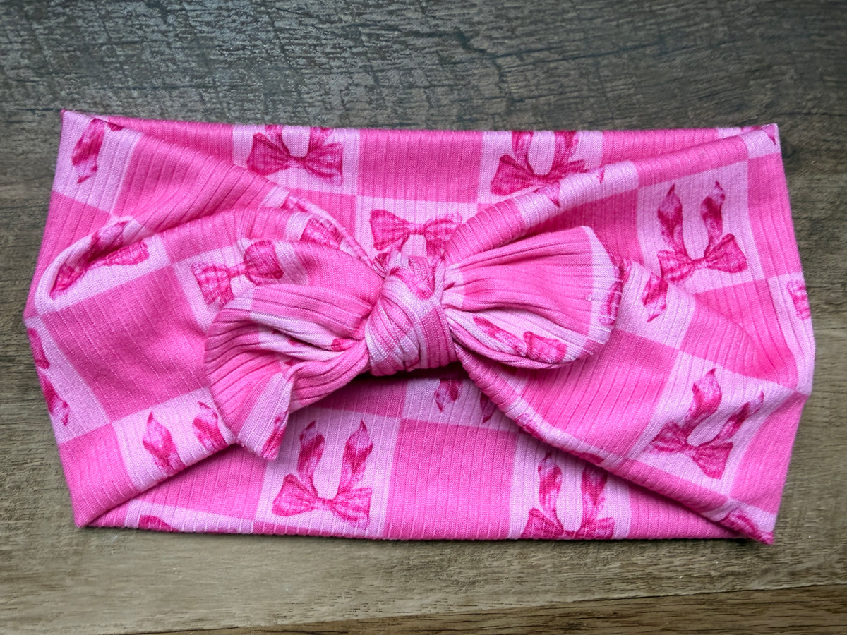 Pink bow checker