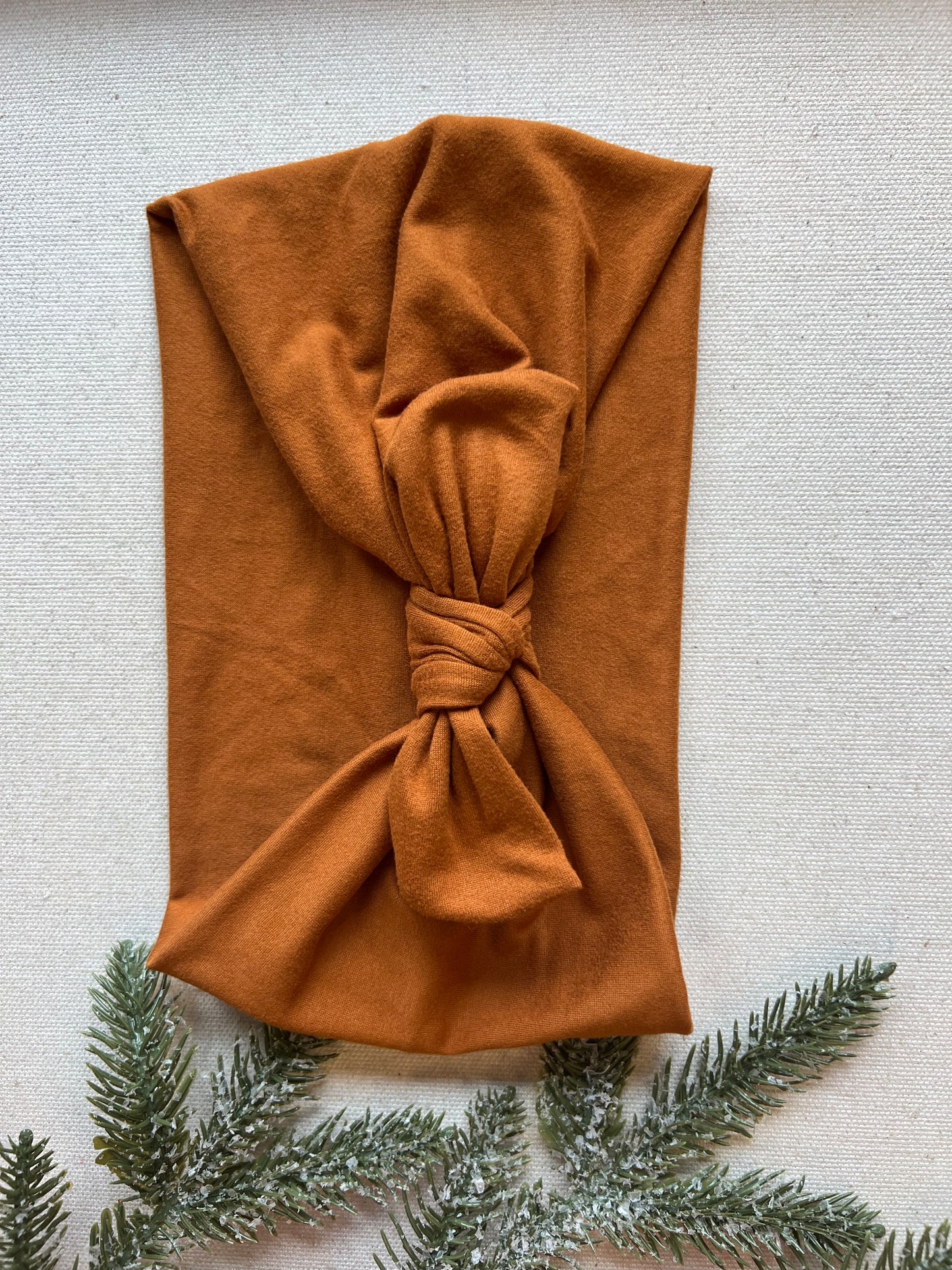 camel faux bow