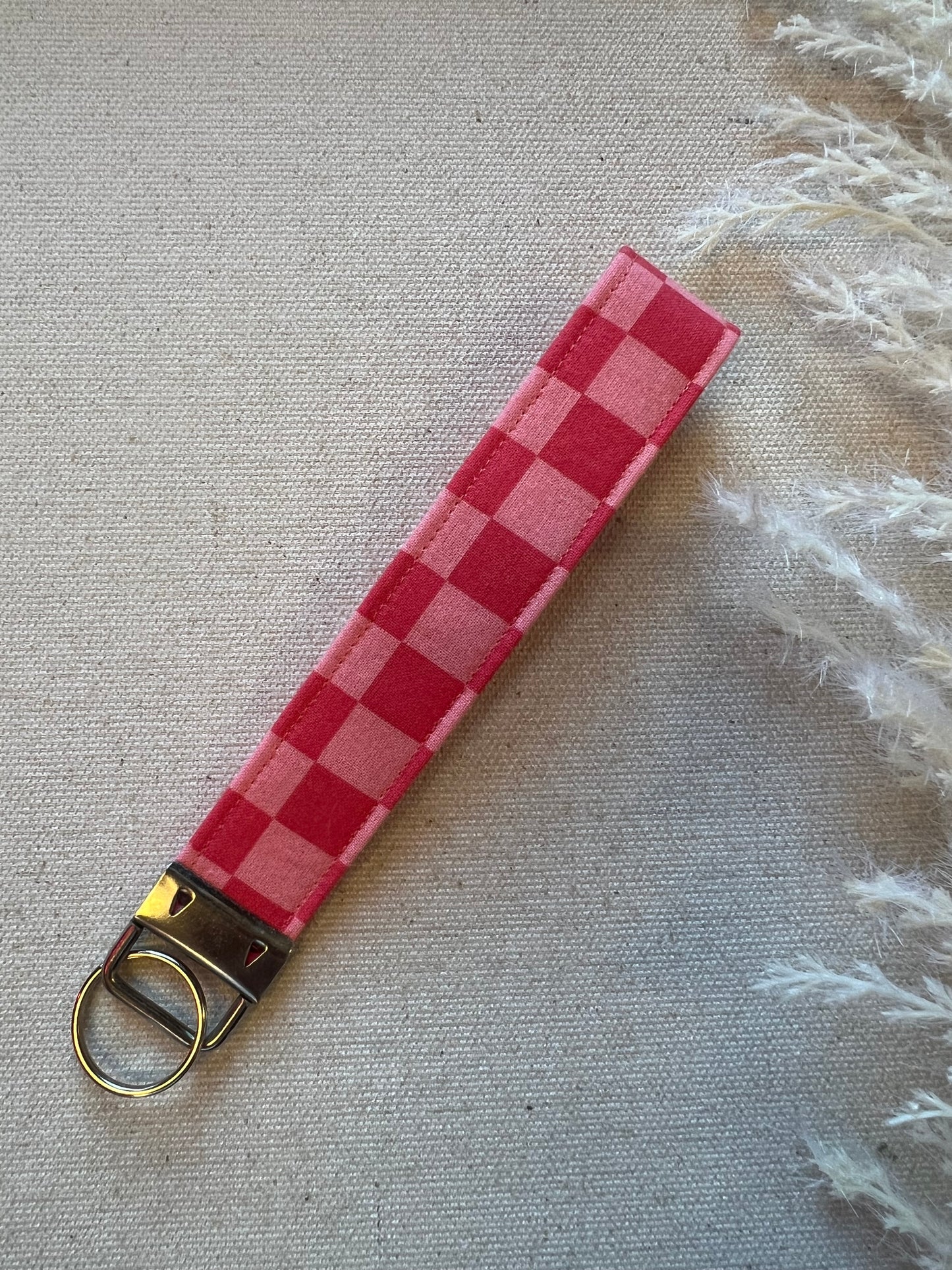 Wrist key chain - coral + pink checker